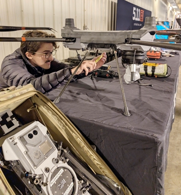 Engineer makes final adjustments 